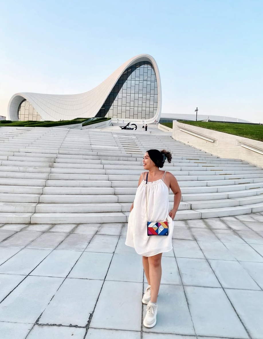 Jhayde walking the steps of the Heydar Aliyev Center in Baku, Azerbaijan